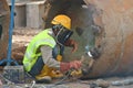 Licence welder weld bore pile auger at construction site